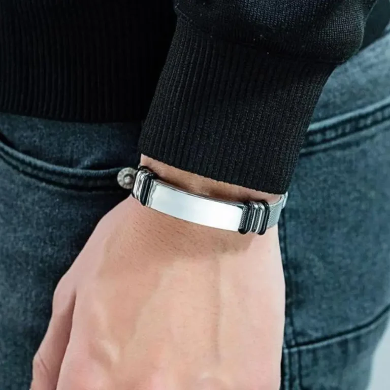 Silver bracelet with black accents on wrist